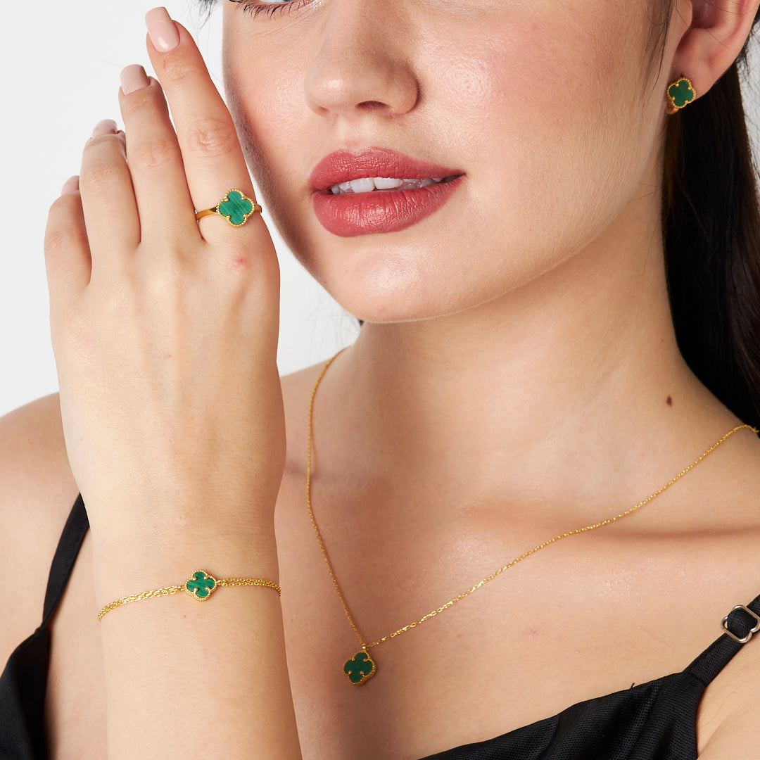 clover leaf set with green stones