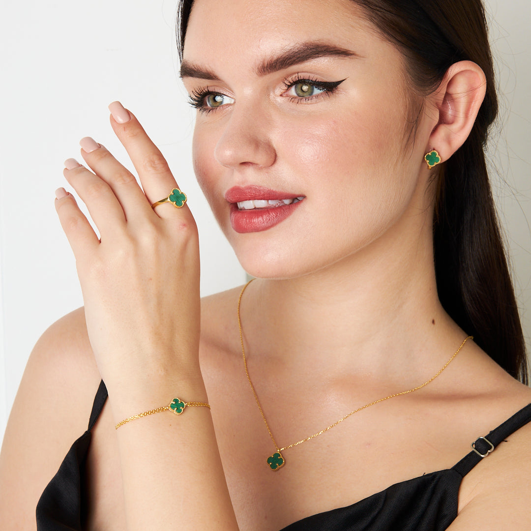 clover leaf set with green stones