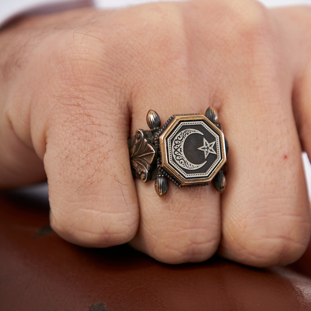 ring with engraved crescent star