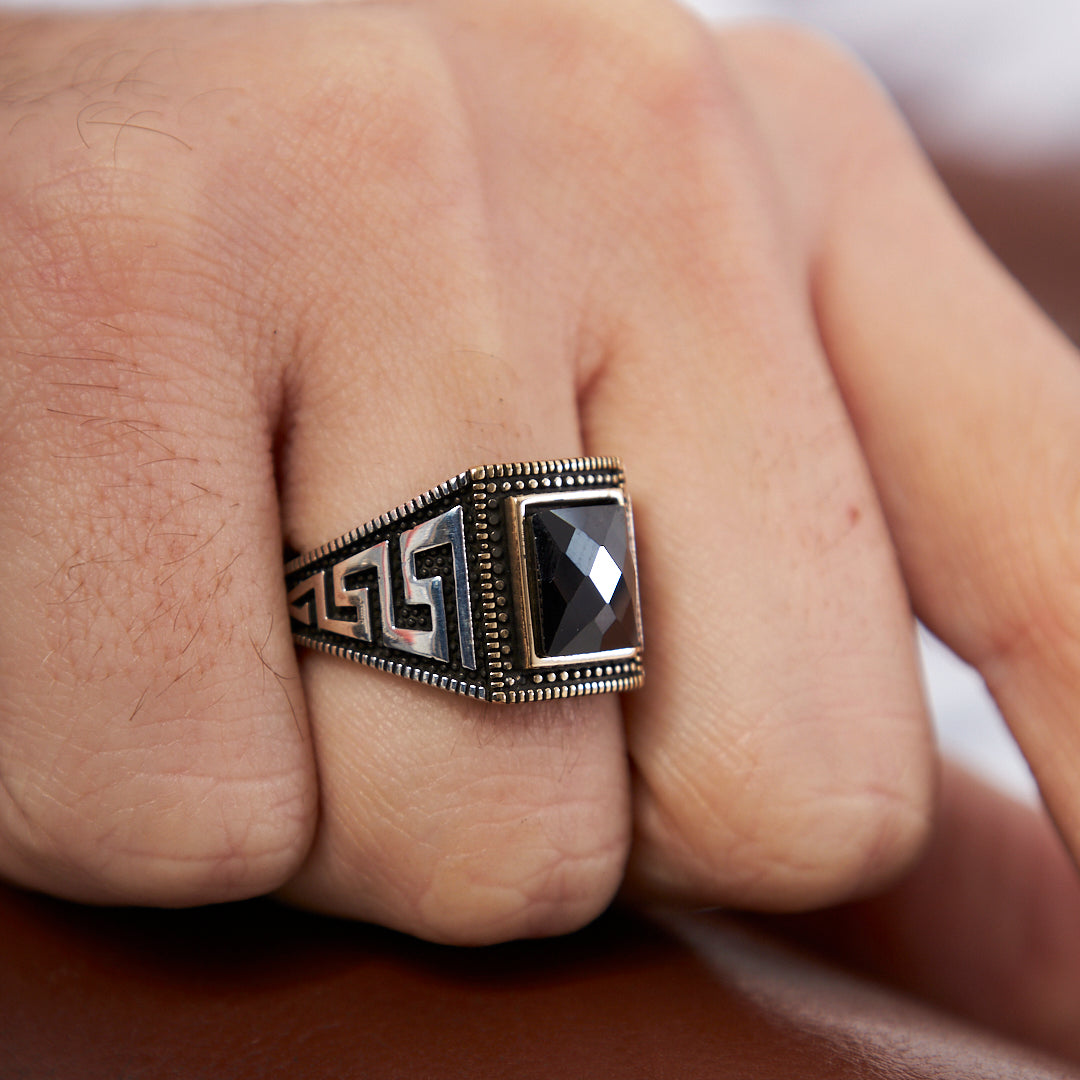 Curved ring with engraving made of black stone