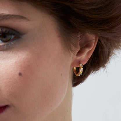 Modern earrings with a stone