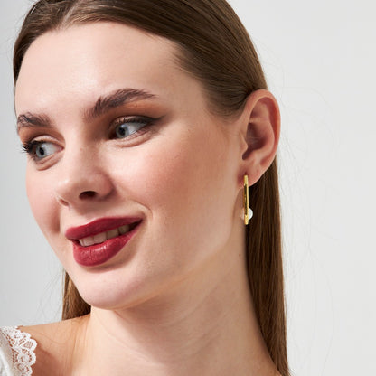 Half-round earrings with pearls