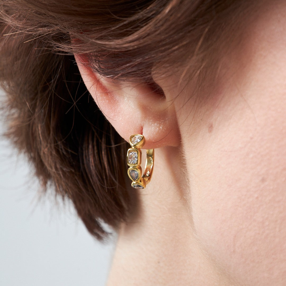 Modern earrings with a stone